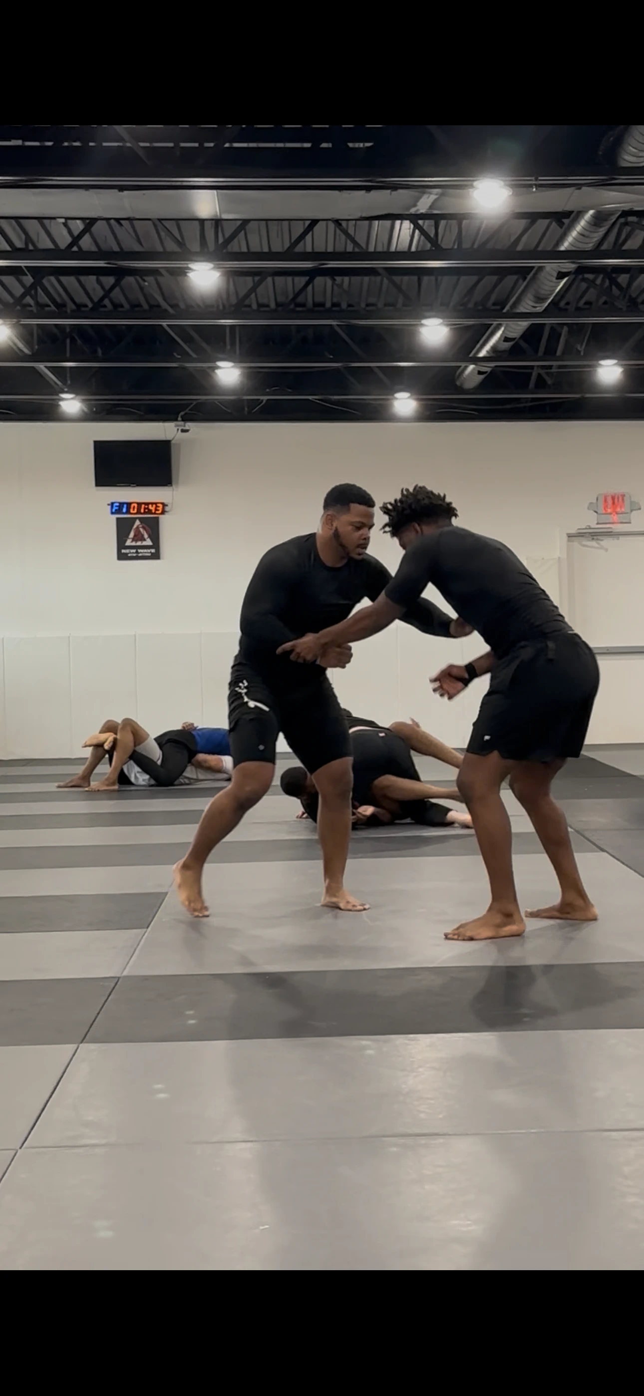 Adults practicing no-gi control